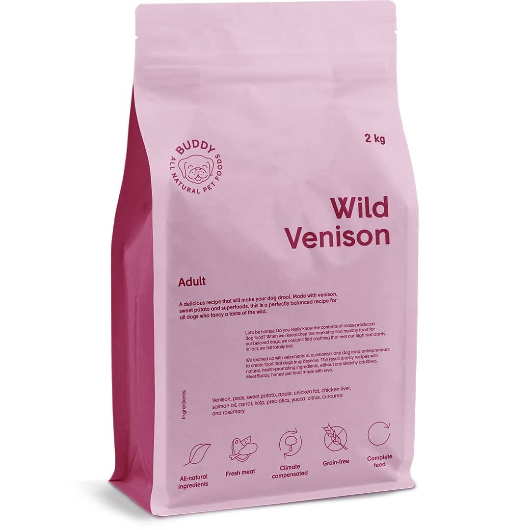 Pink bag of Buddy Foods Wild Venison dog food on a white background