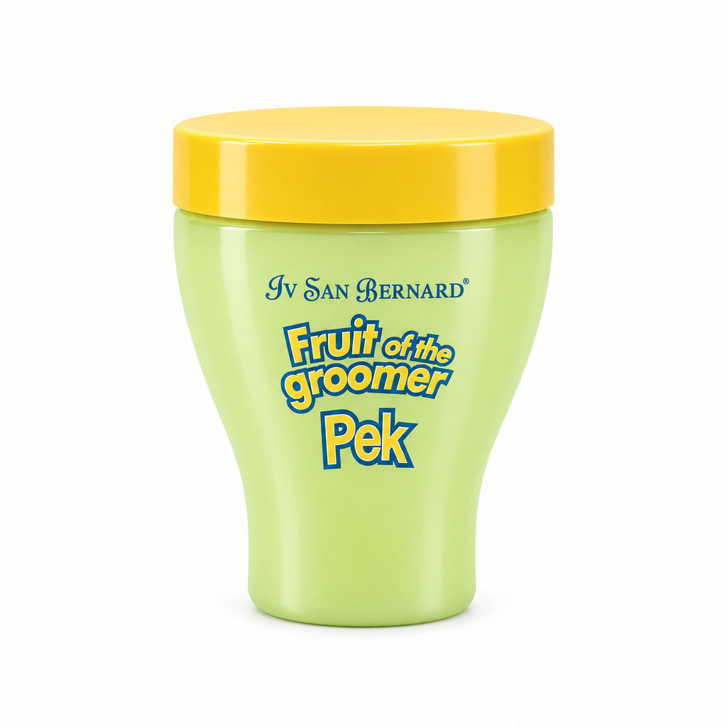A jar of Iv San Bernard Fruit of the Groomer Pek grooming cream, featuring a pale yellow-green body and a bright yellow lid, set against a plain white background.