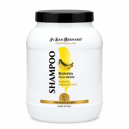 A white plastic tub of IV San Bernard Shampoo for medium coat dogs and cats, featuring a black lid and a yellow banana graphic on the label.
