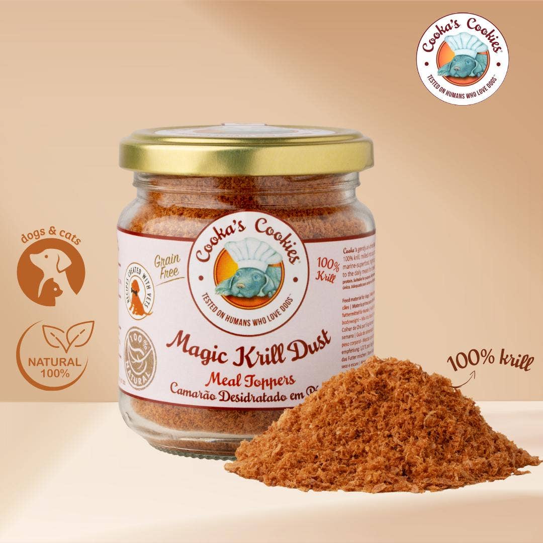 Jar of Coda's Cookies Magic Krill Dust with a pile of the product on a beige background