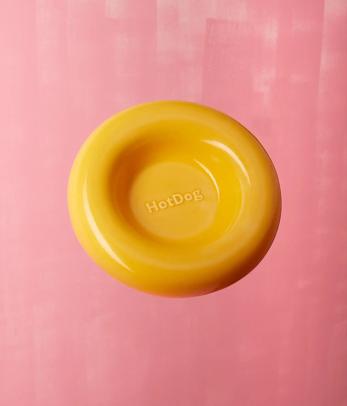 Yellow ceramic dog feeder