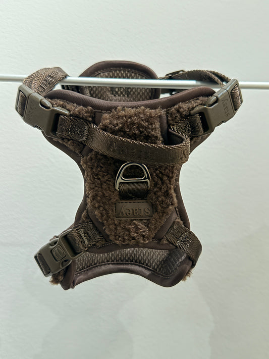 Brown dog harness on a white background
