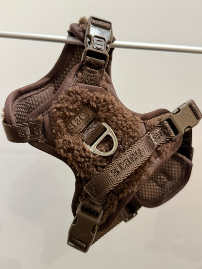 Brown dog harness with sherpa lining on a white background