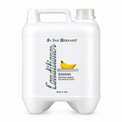 A large white plastic canister of Iv San Bernard Banana Conditioner for medium coats, featuring a handle, screw cap, and a banana graphic on the label.