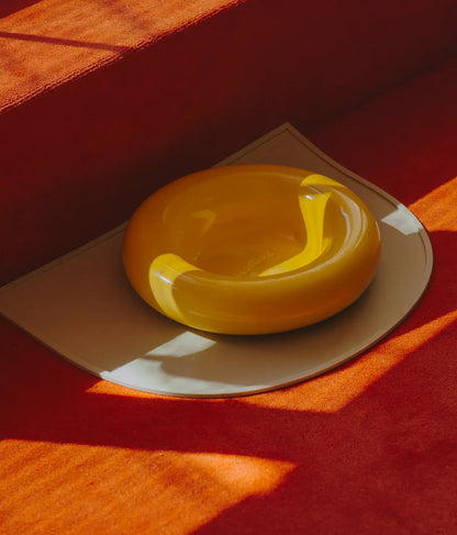 Yellow ceramic dog feeder