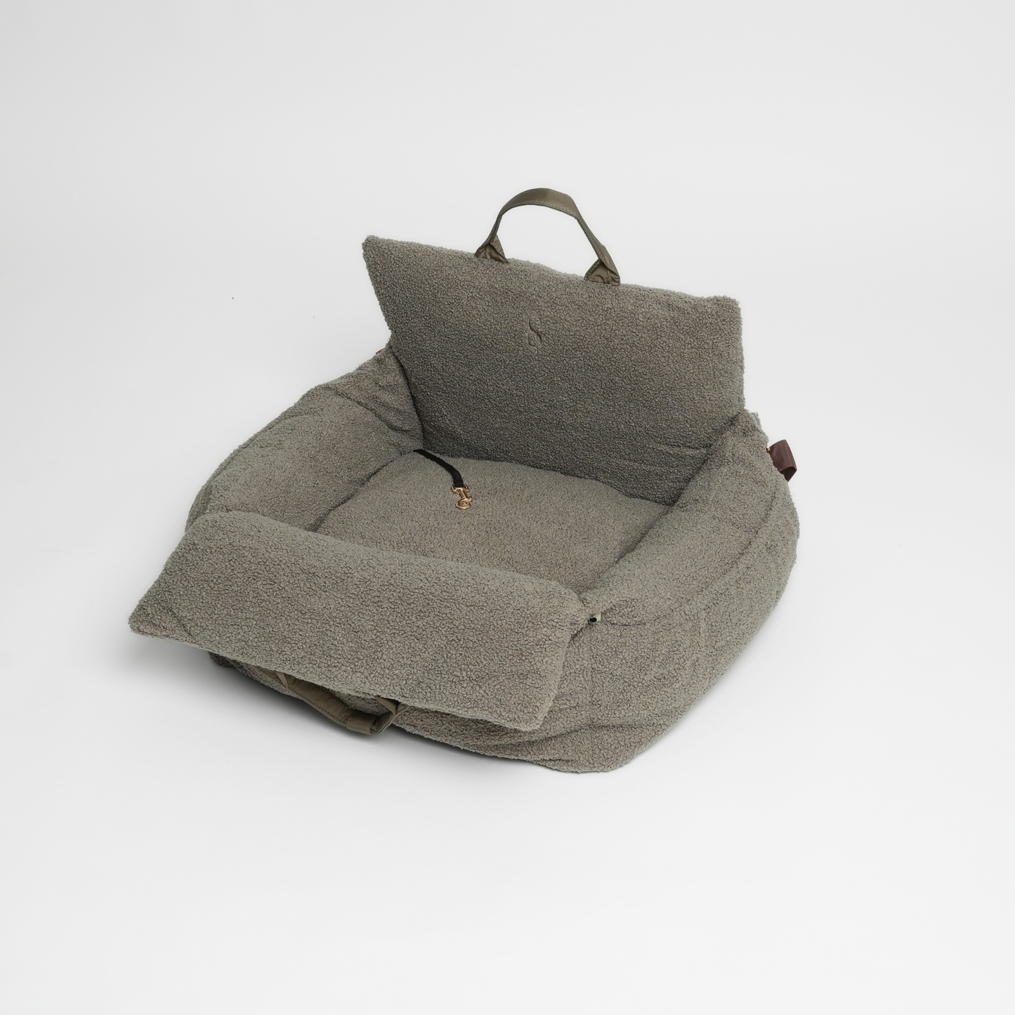 Gray pet bed with a cushion on a white background