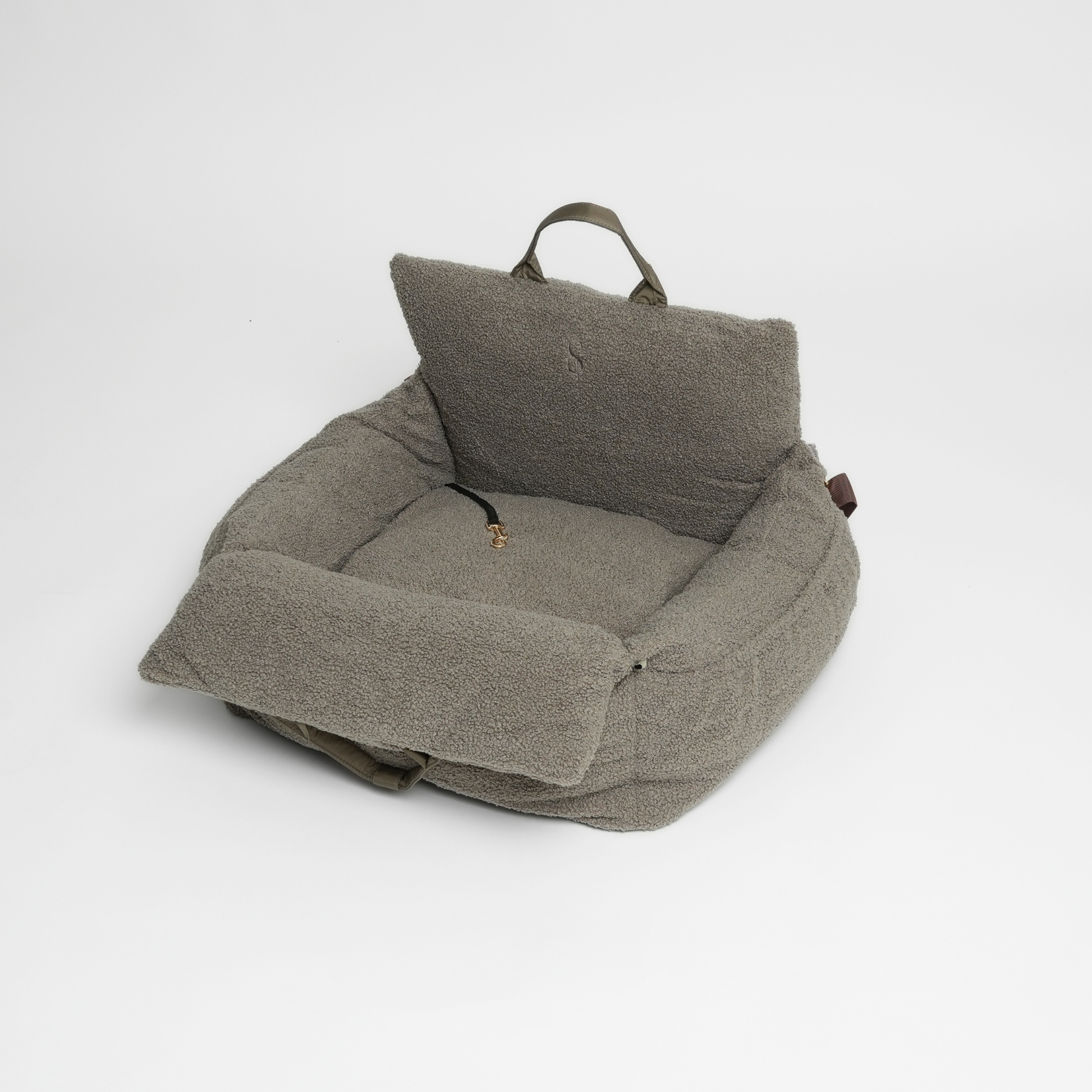 Gray pet bed with a cushion on a white background