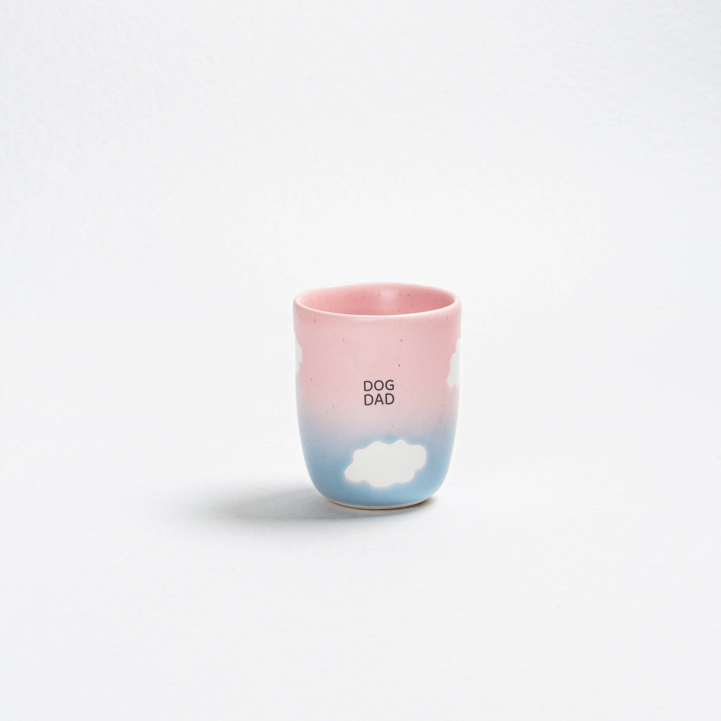 Pink and blue gradient tumbler with 'DOG DAD' text on a white background