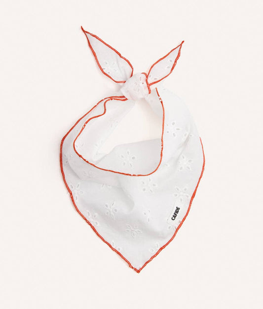 White bandana for dogs with orange trim on a white background