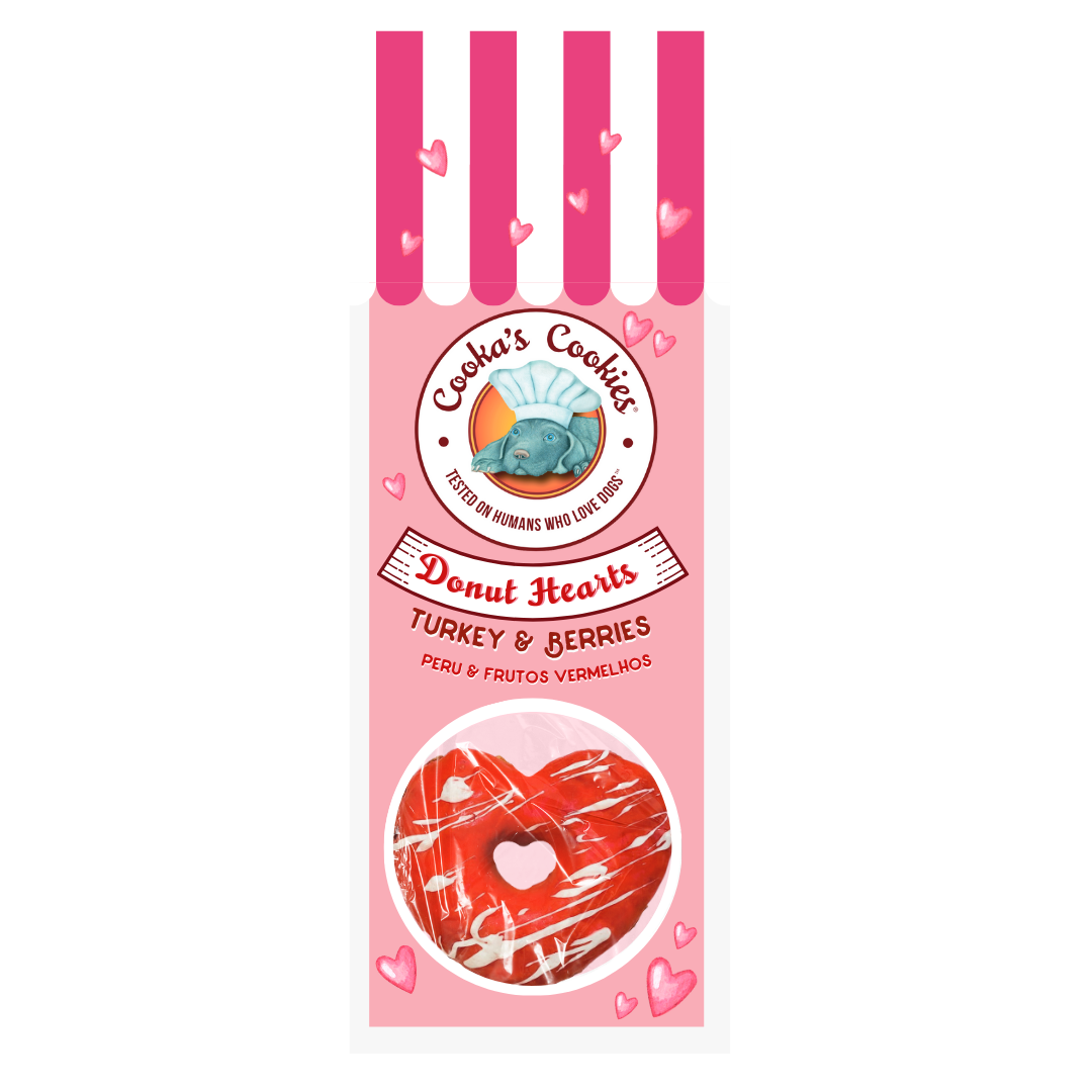 Pink packaging of Cooka's Cookies Donut Hearts with heart designs on a white background