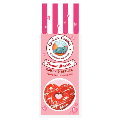 Pink packaging of Cooka's Cookies Donut Hearts with heart designs on a white background