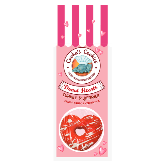 Pink packaging of Cooka's Cookies Donut Hearts with heart designs on a white background