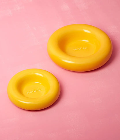 Yellow ceramic dog feeder