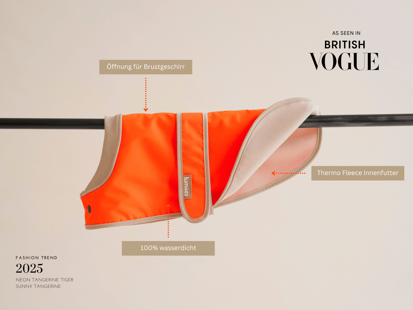 Orange dog coat with text indicating features and a mention of British Vogue on a beige background