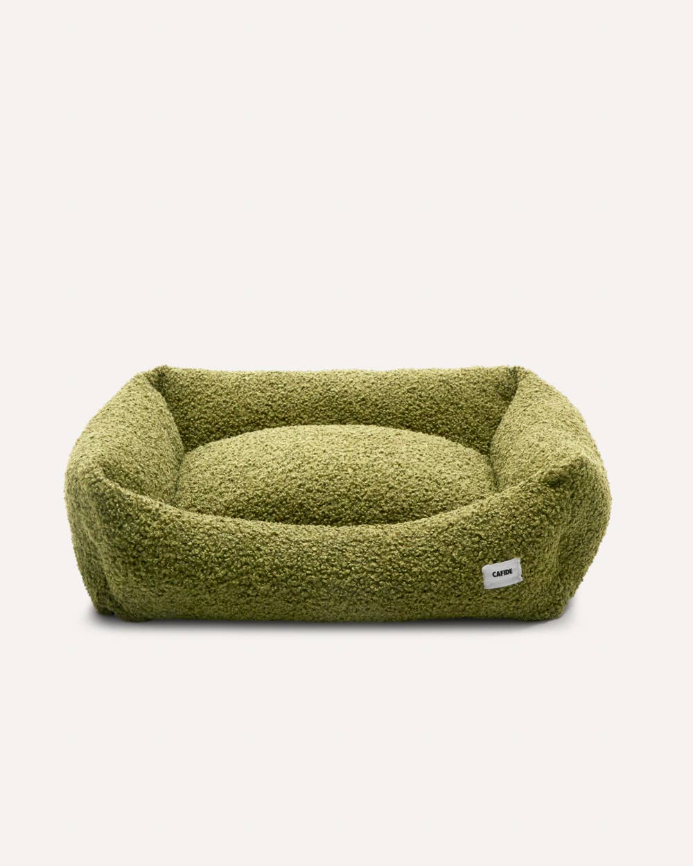 Green pet bed on a white background