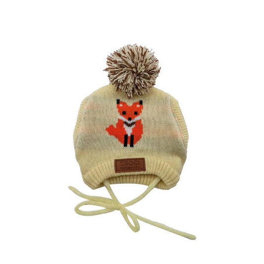 Knitted beanie with fox design and pom-pom on a white background