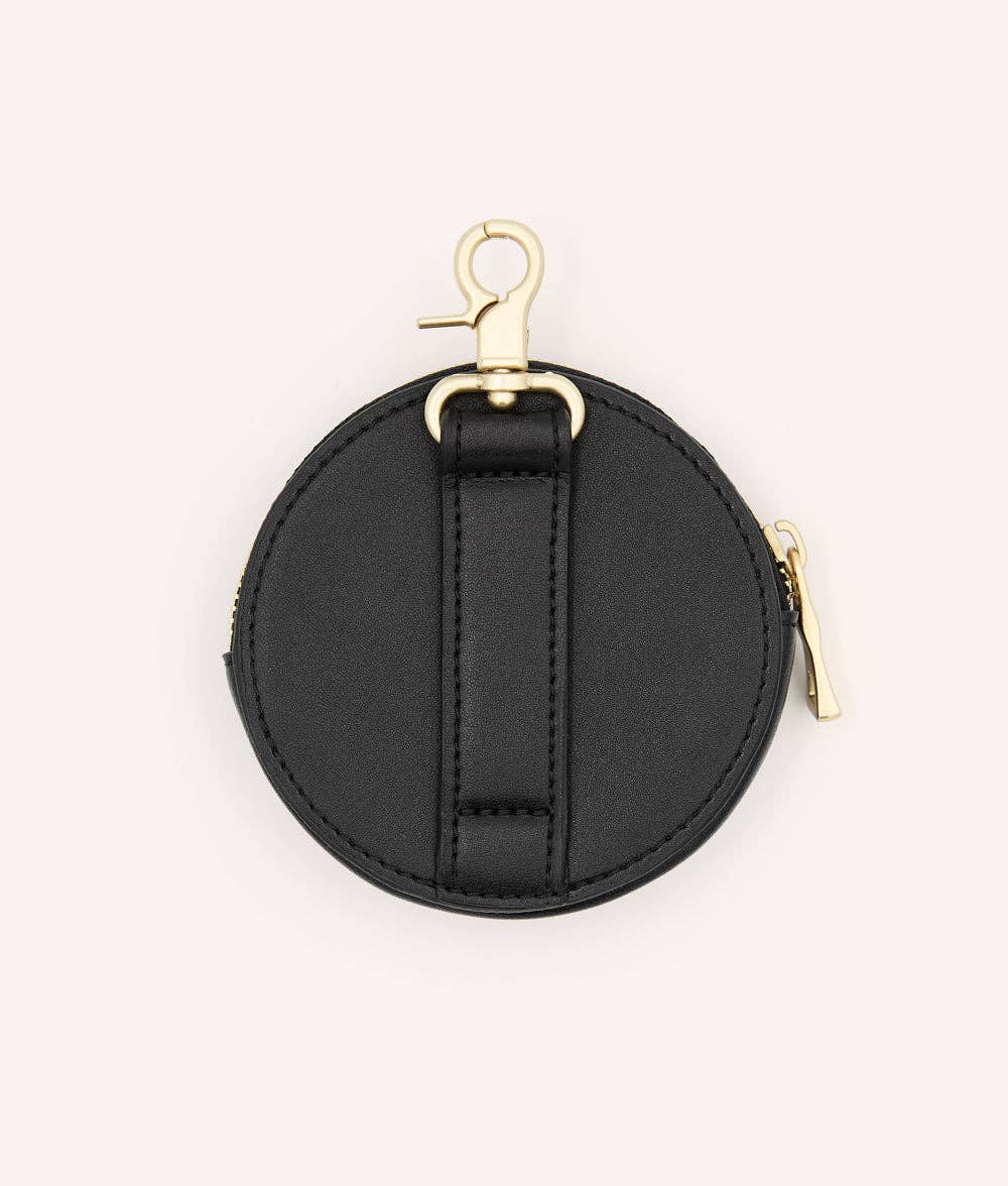 Black round coin purse with gold zipper and clasp on a white background