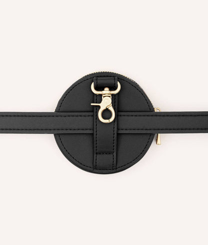 Black round pouch with gold clasp on a white background