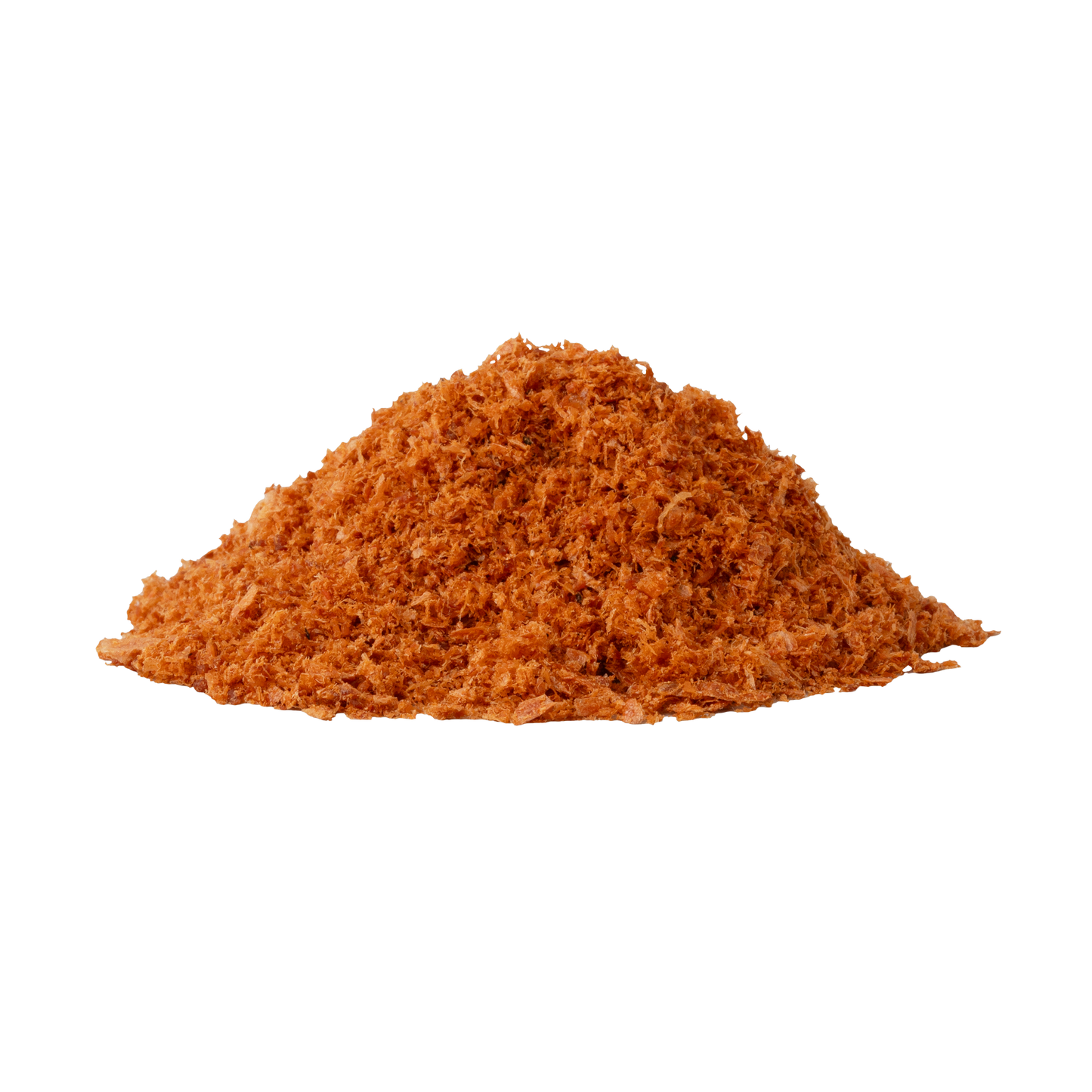 Pile of red-orange powder on a white background