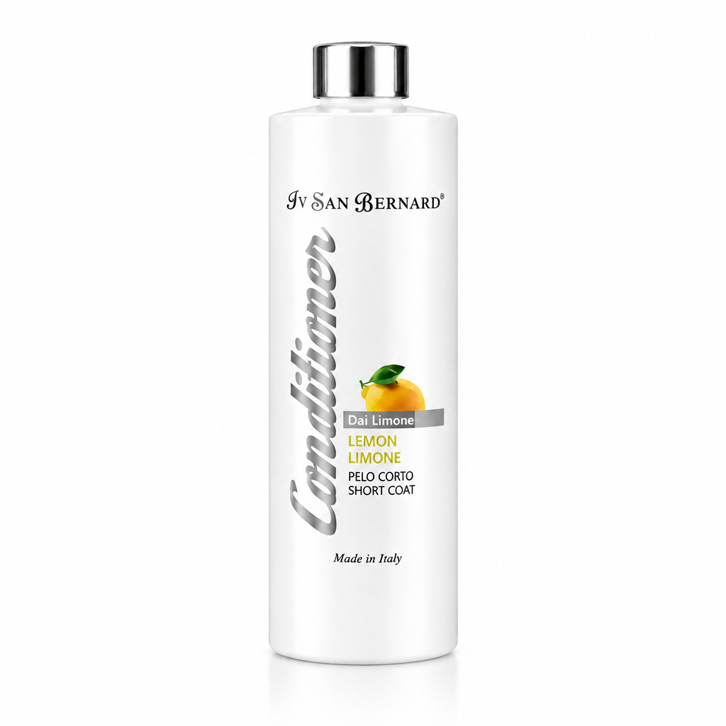 A white bottle of Iv San Bernard Conditioner for short coats in Lemon scent, featuring a silver cap and a label with yellow lemon graphics, set against a plain white background.