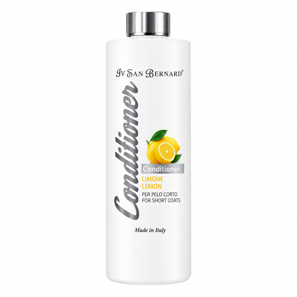 A white bottle of Iv San Bernard Conditioner for short coats in Lemon scent, featuring a silver cap and a label with yellow lemon graphics, set against a plain white background.
