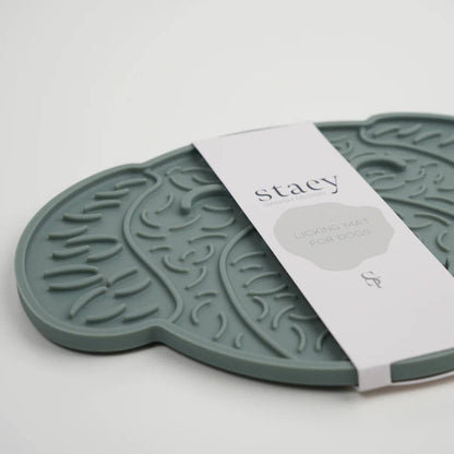 Green dog mat with 'Staey' branding on a white background