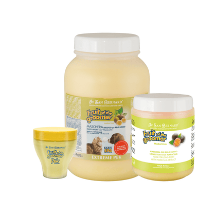 Three Iv San Bernard dog mask products on a white background: a large jar of Fruit of the Groomer Passionfruit mask, a smaller jar of Fruit of the Groomer Maracuja, and a small jar of Fruit of the Groomer Peony.