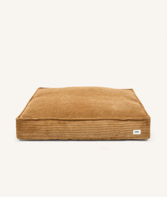 Brown rectangular pet bed on a white background