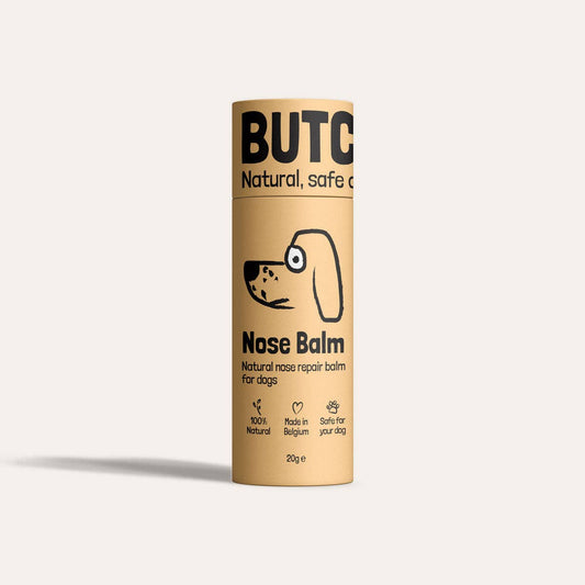 Butch Nose Balm packaging for dogs on a beige background