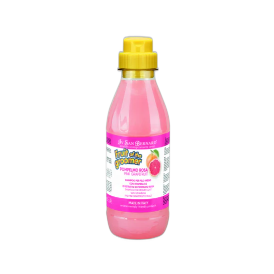 Pink bottle with yellow cap on a white background