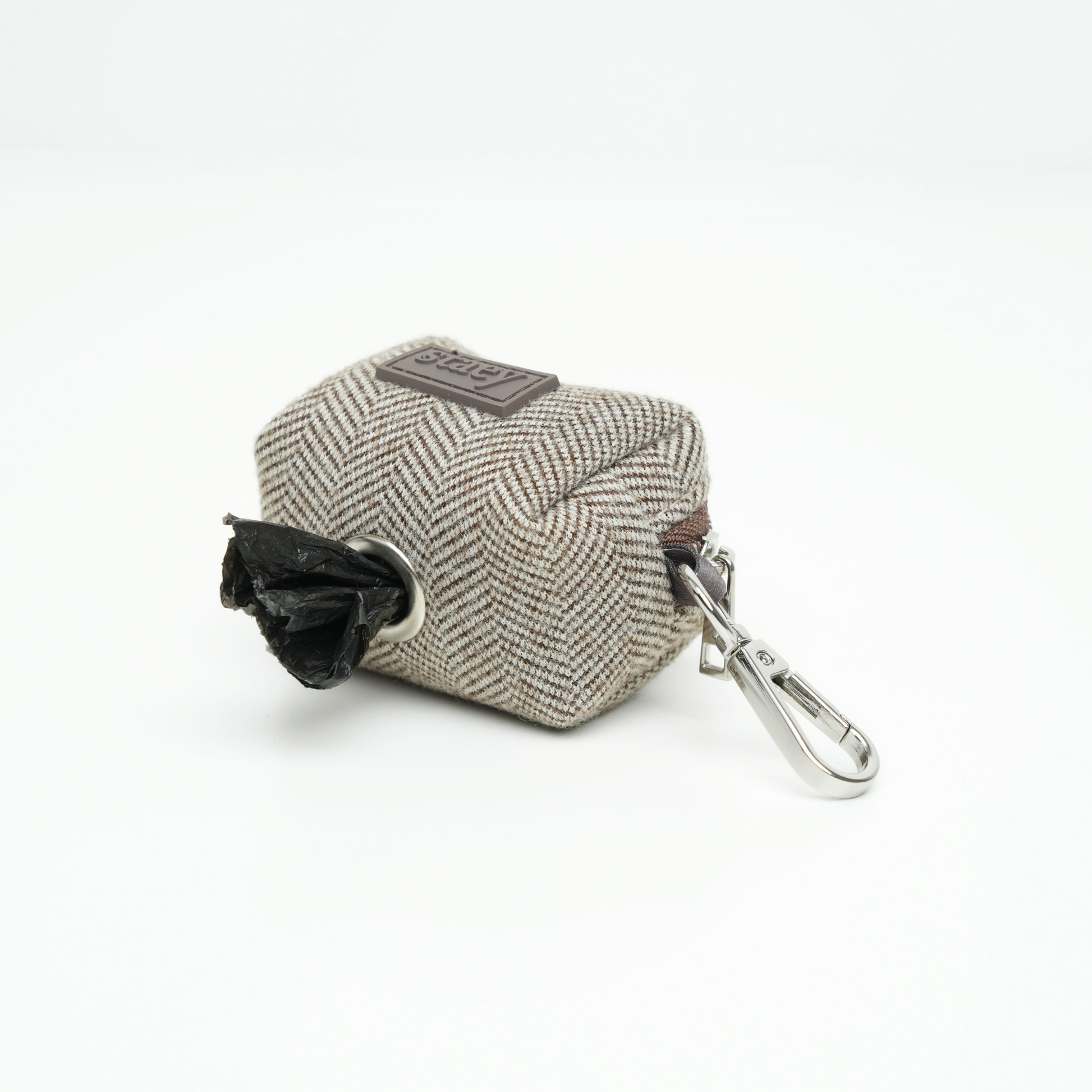 Fabric pouch with a carabiner on a white background