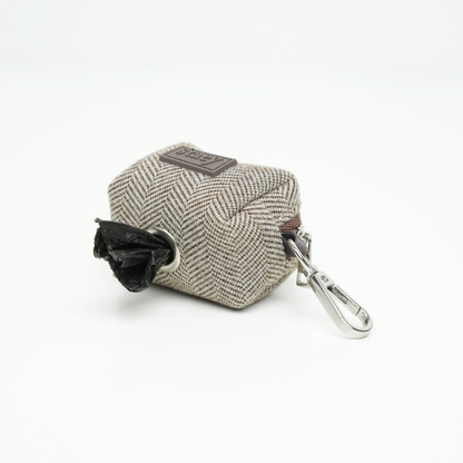 Fabric pouch with a carabiner on a white background