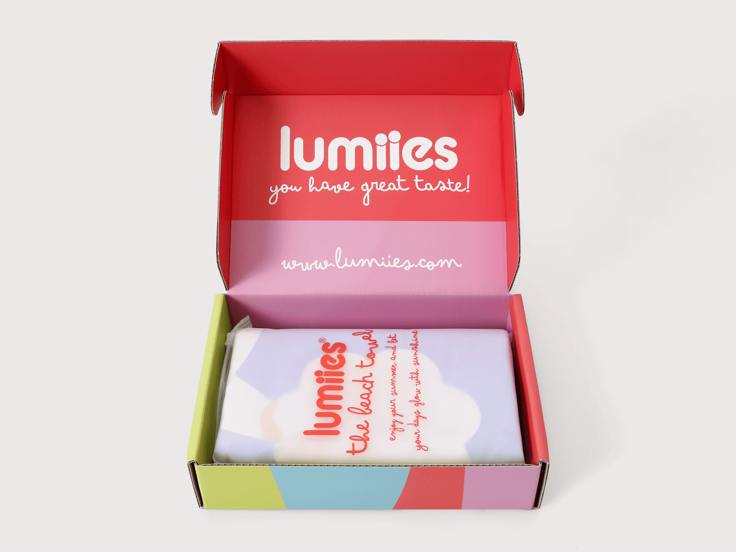 Open box with lumies branding on a light gray background