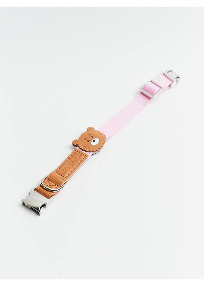 Bear-themed collar with pink and brown sections on a white background
