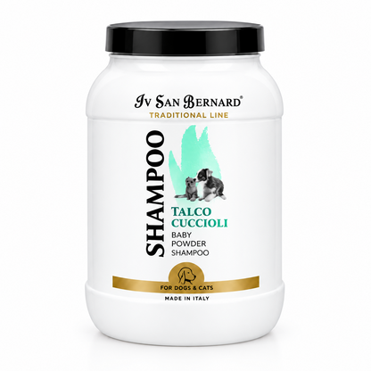 A white plastic tub of Iv San Bernard Talco Puppy Shampoo with a black lid, featuring a label with a black and white dog, teal graphic, and gold accents.