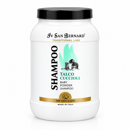 A white plastic tub of Iv San Bernard Talco Puppy Shampoo with a black lid, featuring a label with a black and white dog, teal graphic, and gold accents.