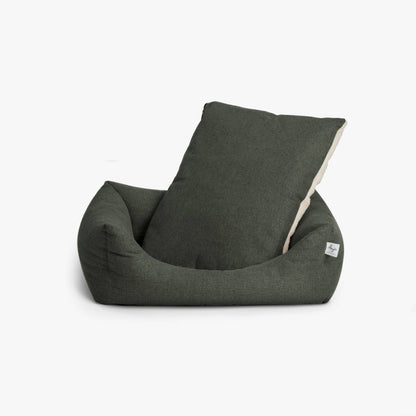 Dark gray bean bag chair with a pillow on a white background