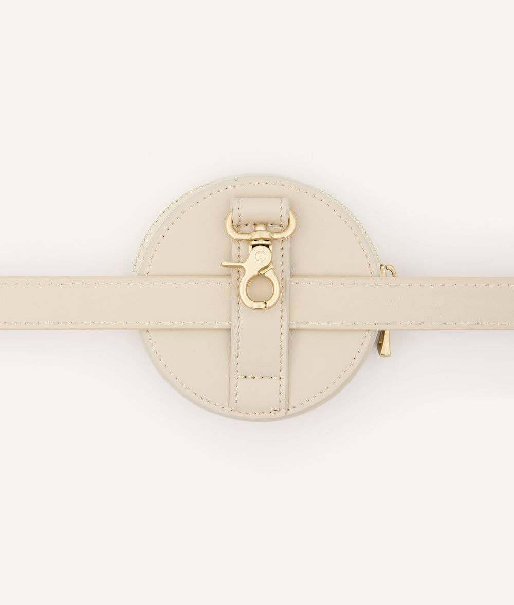 Beige round belt treat bag with gold buckle on a white background