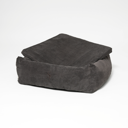 Dark gray bean bag chair on a white background